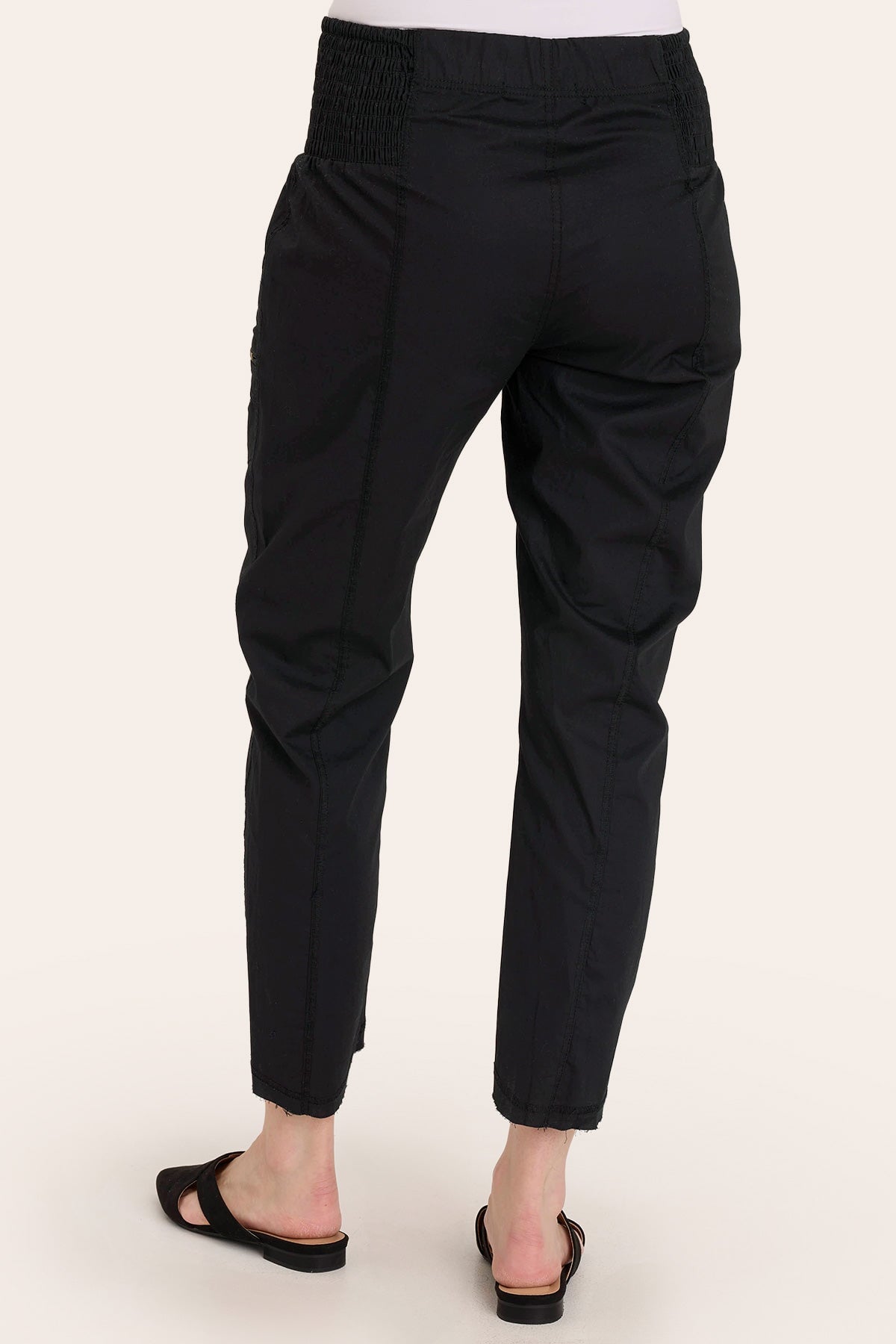 Core by Acker Zipper Slim Crop with shirred panels, zipper pockets, and raw-edge distressed rounded hem in Black  - XCVI