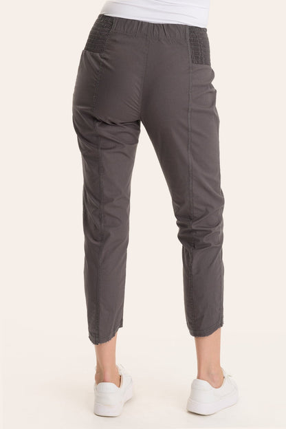 Core by Acker Zipper Slim Crop with shirred panels, zipper pockets, and raw-edge distressed rounded hem in Grey  - XCVI