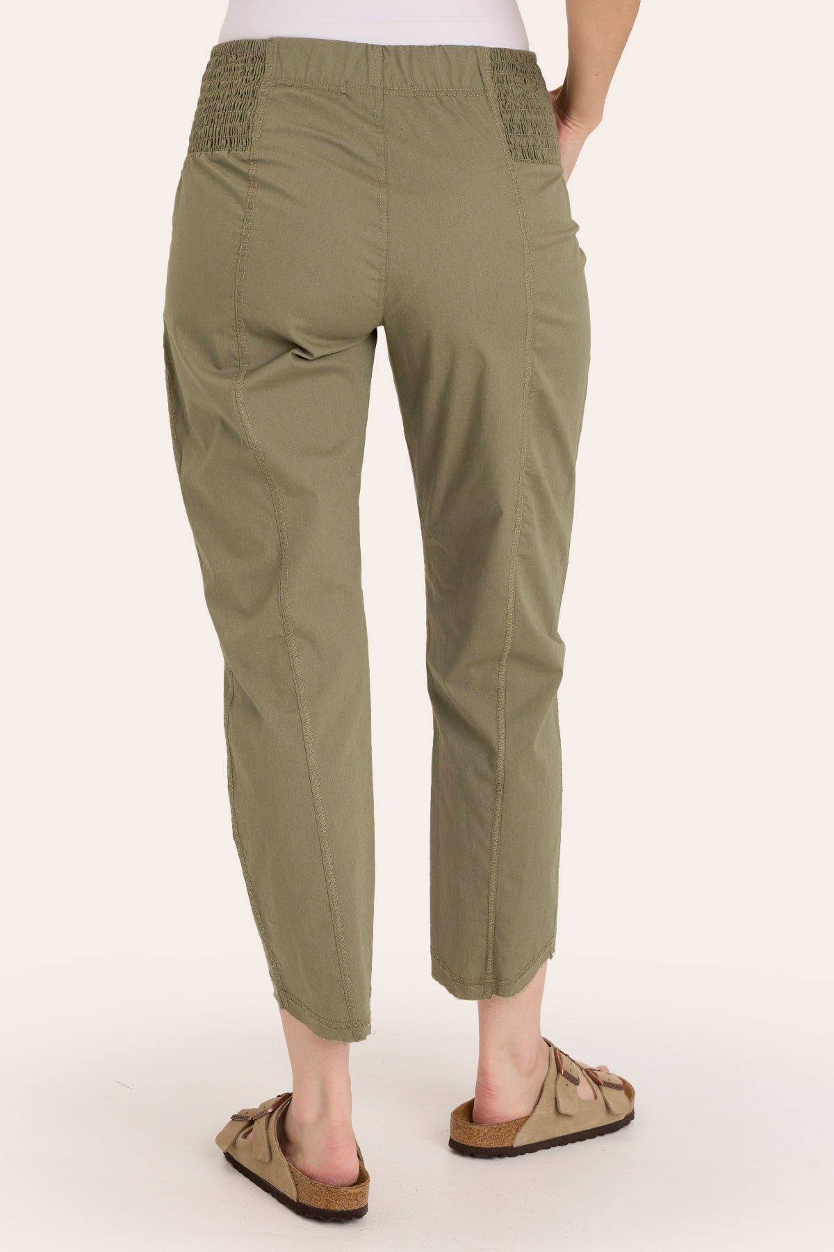 Core by Acker Zipper Slim Crop with shirred panels, zipper pockets, and raw-edge distressed rounded hem in Green  - XCVI