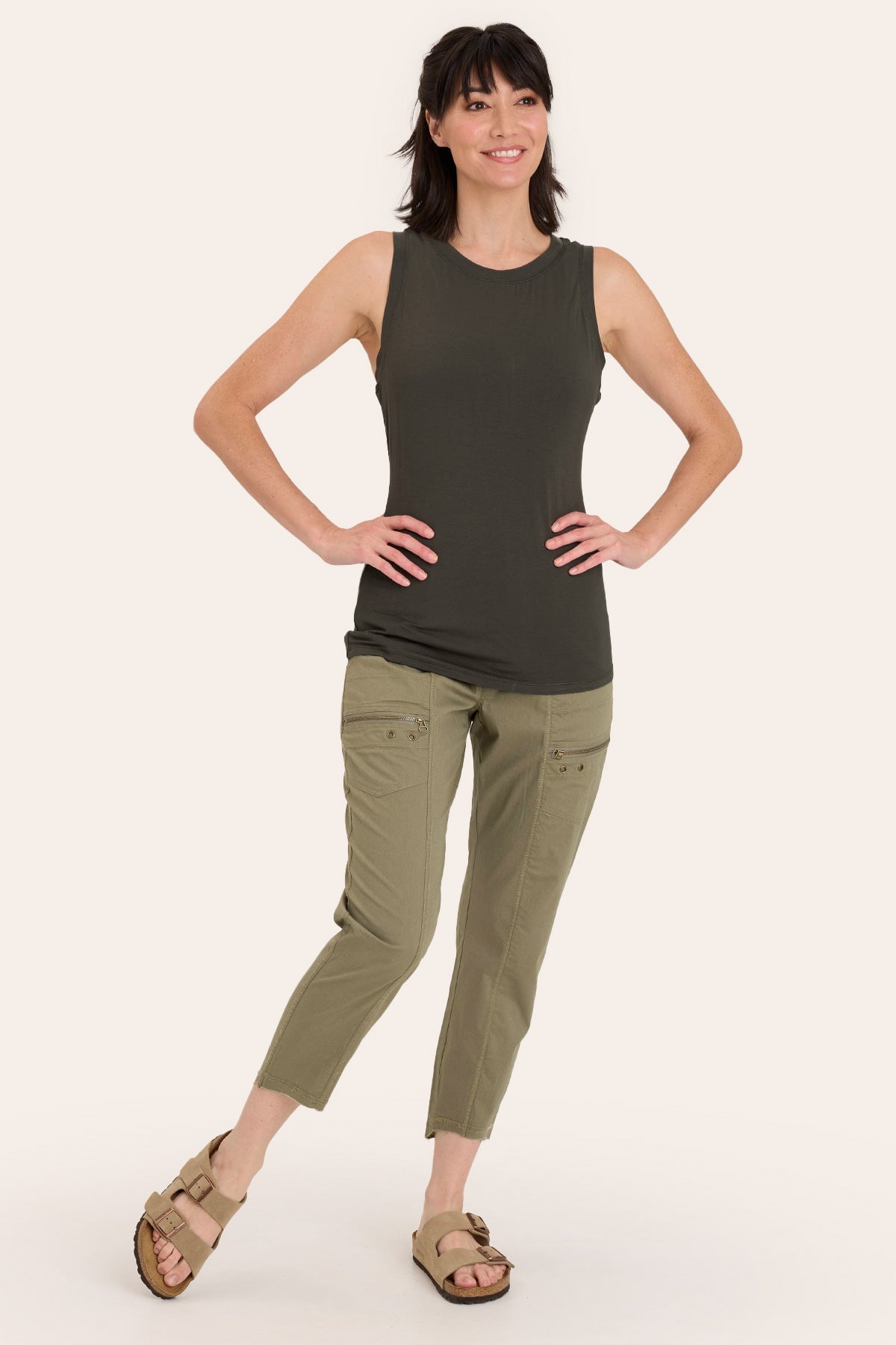 Core by Acker Zipper Slim Crop with shirred panels, zipper pockets, and raw-edge distressed rounded hem in Green  - XCVI