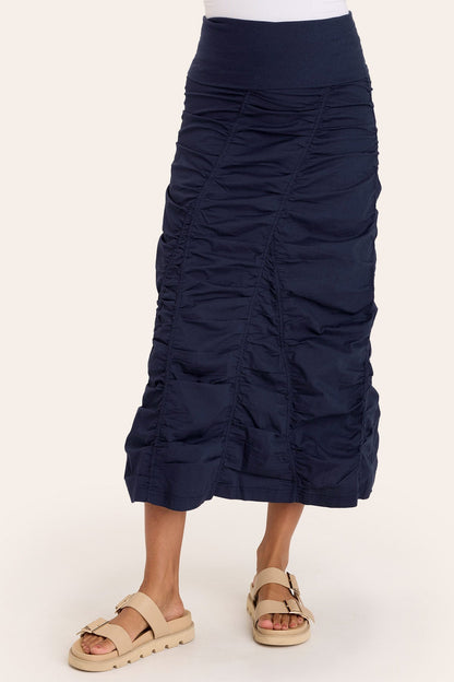 Core by Shirred Panel Asymmetric Midi Skirt in Stretch Poplin with jersey pull-on foldover waistband and gored section in Blue  - XCVI
