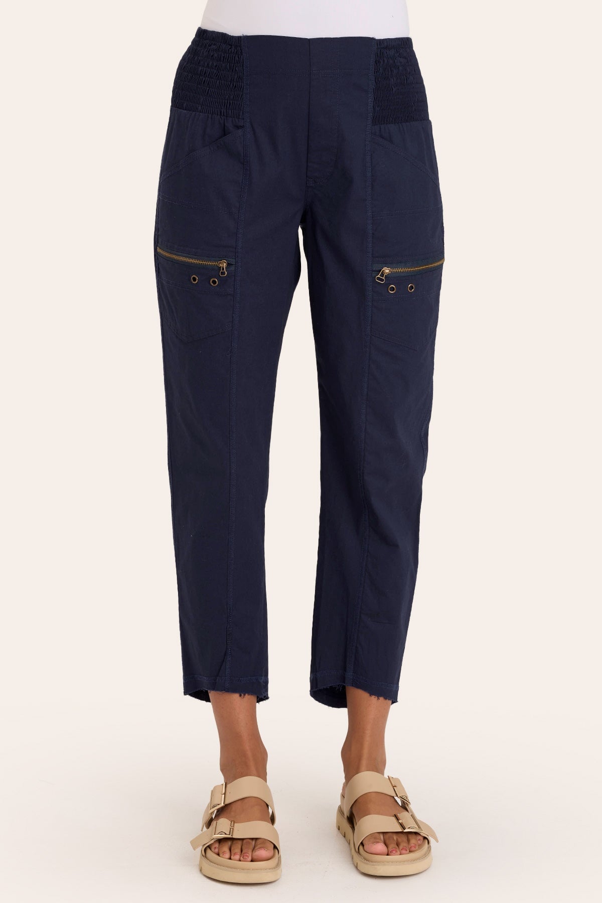 Core by Acker Zipper Slim Crop with shirred panels, zipper pockets, and raw-edge distressed rounded hem in Blue  - XCVI