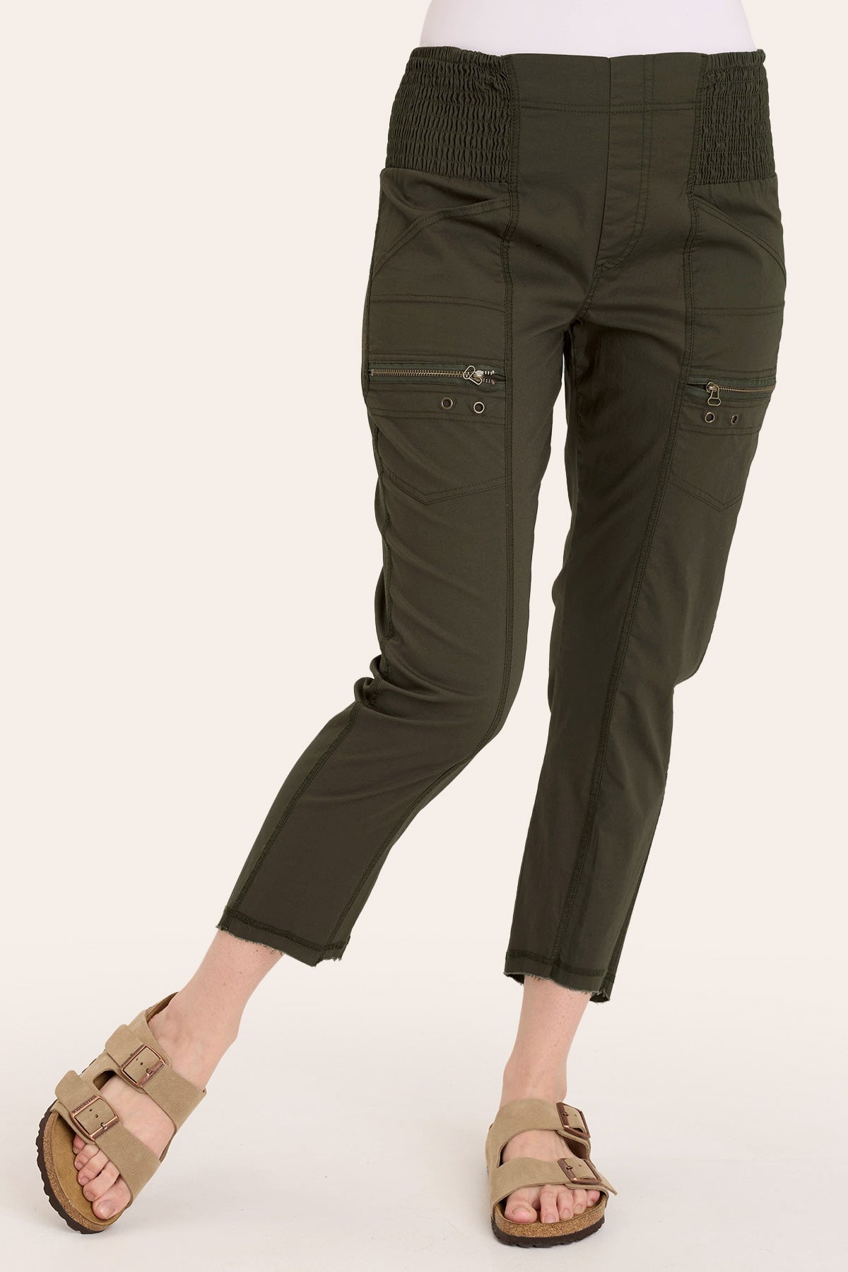 Core by Acker Zipper Slim Crop with shirred panels, zipper pockets, and raw-edge distressed rounded hem in Green  - XCVI