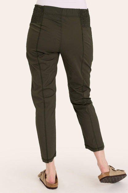 Core by Acker Zipper Slim Crop with shirred panels, zipper pockets, and raw-edge distressed rounded hem in Green  - XCVI