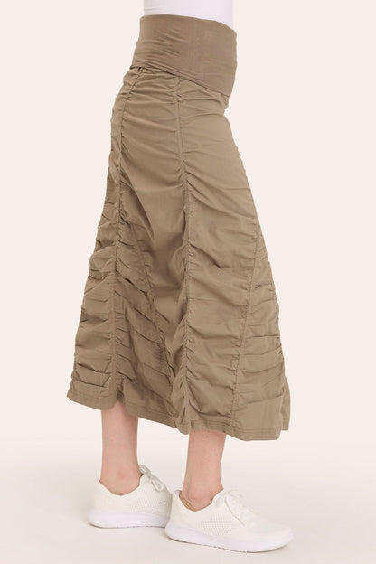 Core by Shirred Panel Asymmetric Midi Skirt in Stretch Poplin with jersey pull-on foldover waistband and gored section in Brown  - XCVI