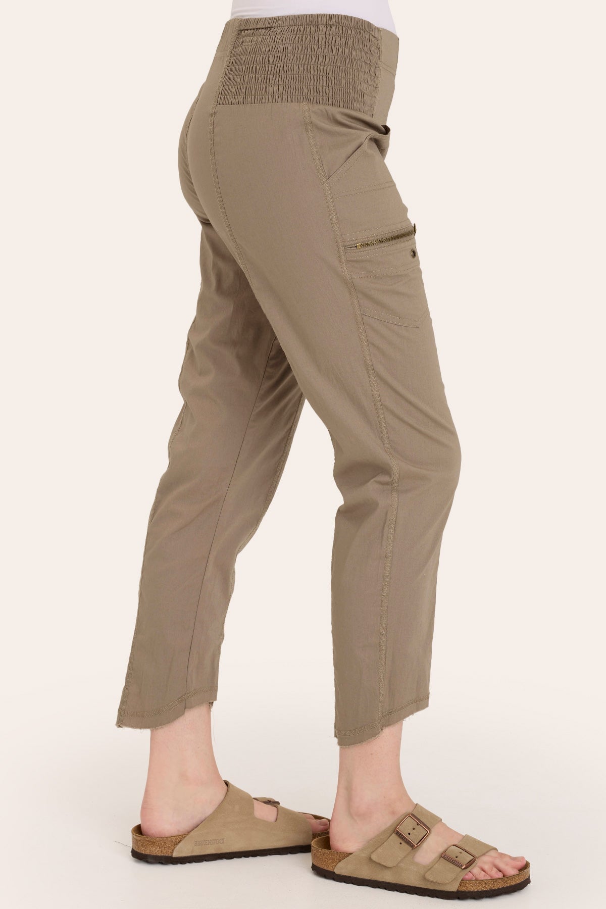 Core by Acker Zipper Slim Crop with shirred panels, zipper pockets, and raw-edge distressed rounded hem in Brown  - XCVI