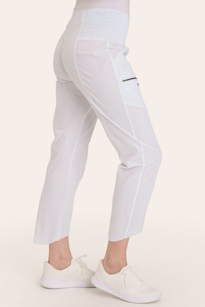 Core by Acker Zipper Slim Crop with shirred panels, zipper pockets, and raw-edge distressed rounded hem in White  - XCVI