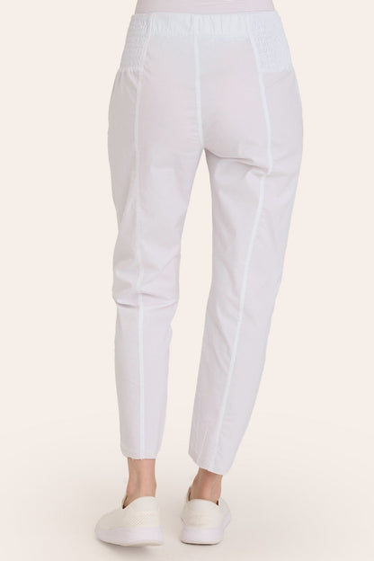 Core by Acker Zipper Slim Crop with shirred panels, zipper pockets, and raw-edge distressed rounded hem in White  - XCVI