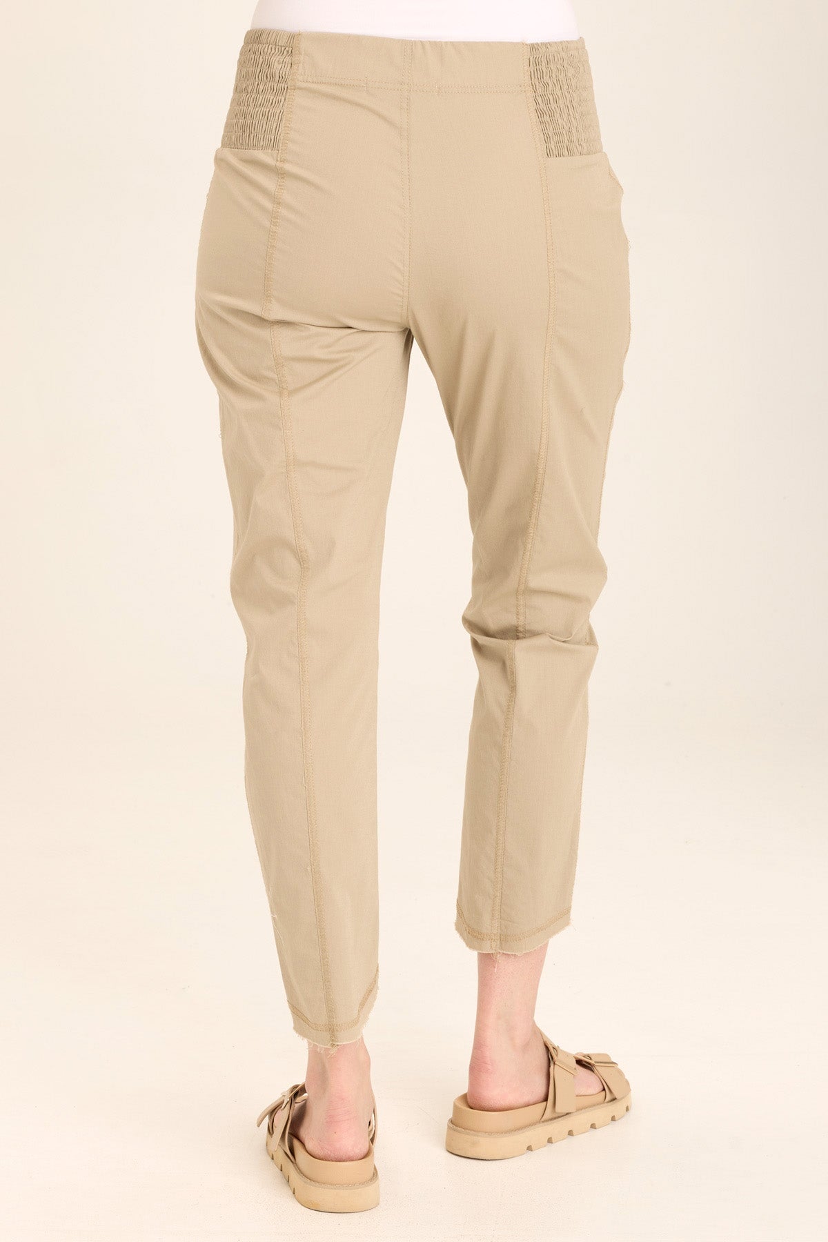 Wearables Acker Zipper Slim Crop with shirred panels, zipper pockets, and raw-edge distressed rounded hem in Beige  - XCVI
