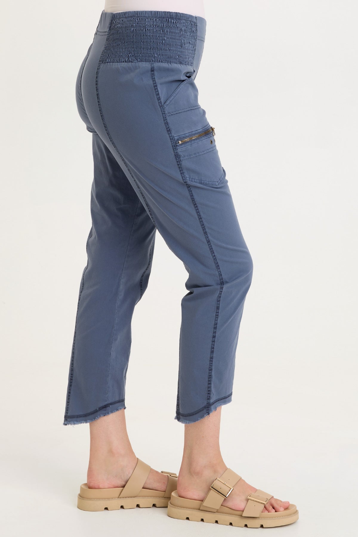 Wearables Acker Zipper Slim Crop with shirred panels, zipper pockets, and raw-edge distressed rounded hem in Blue  - XCVI