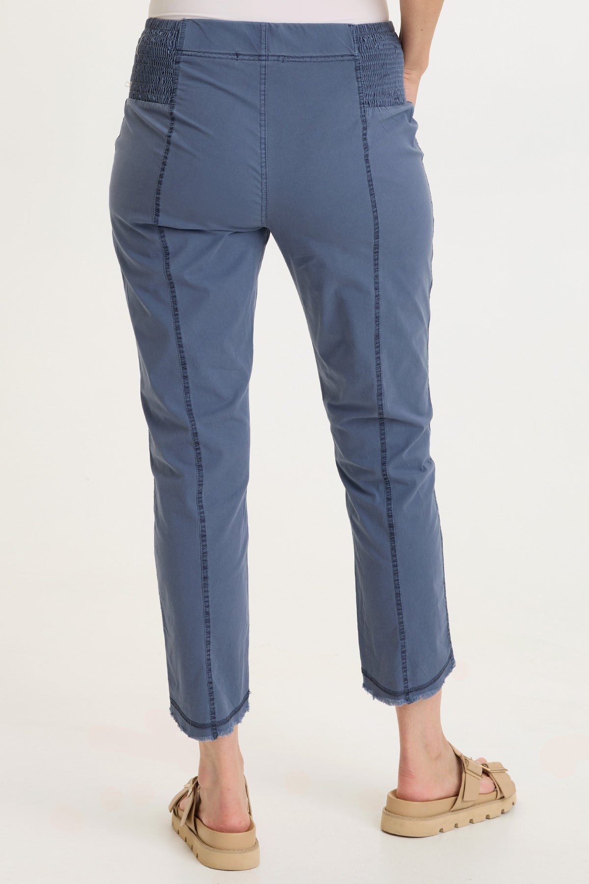 Wearables Acker Zipper Slim Crop with shirred panels, zipper pockets, and raw-edge distressed rounded hem in Blue  - XCVI