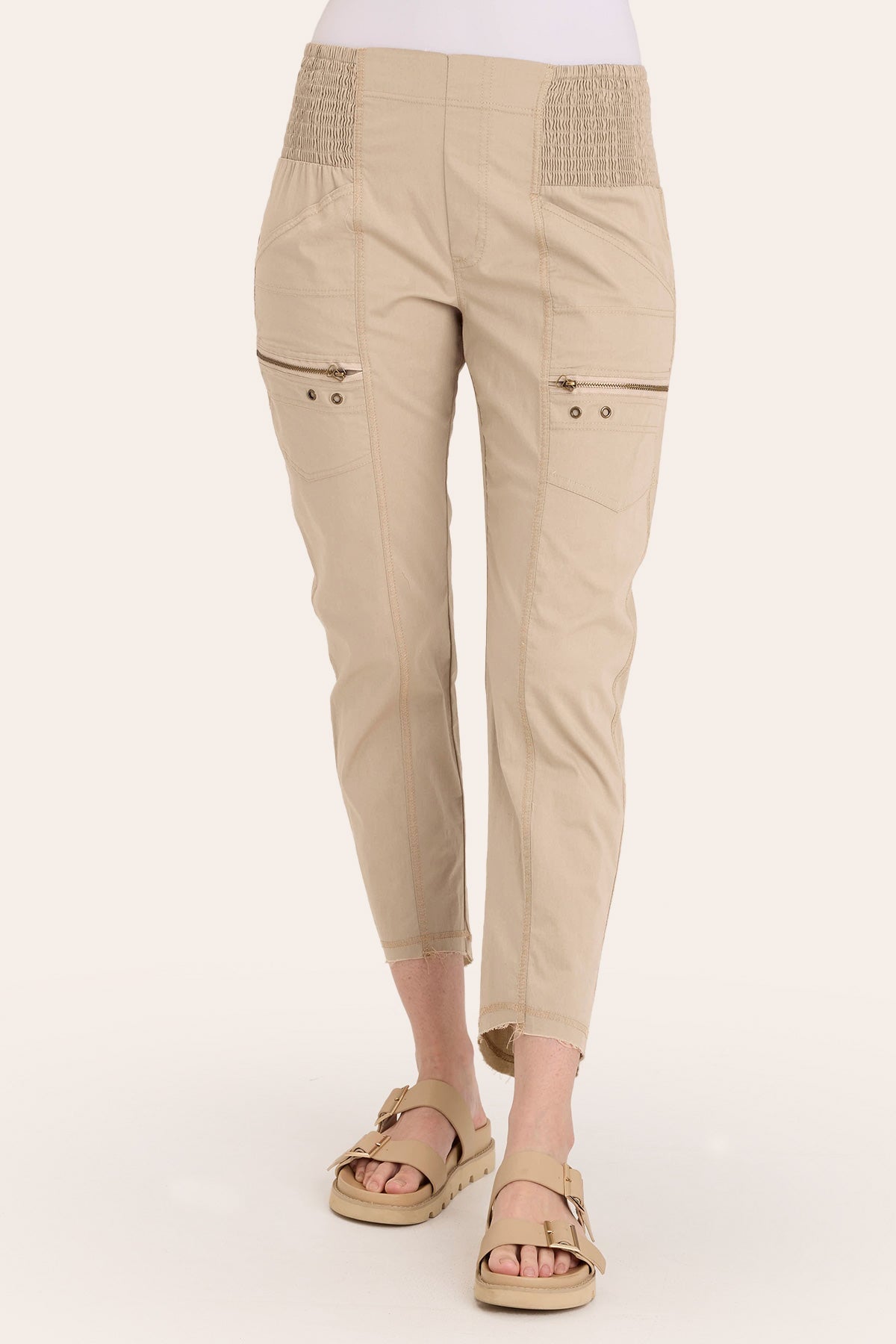 Core by Acker Zipper Slim Crop with shirred panels, zipper pockets, and raw-edge distressed rounded hem in Beige  - XCVI