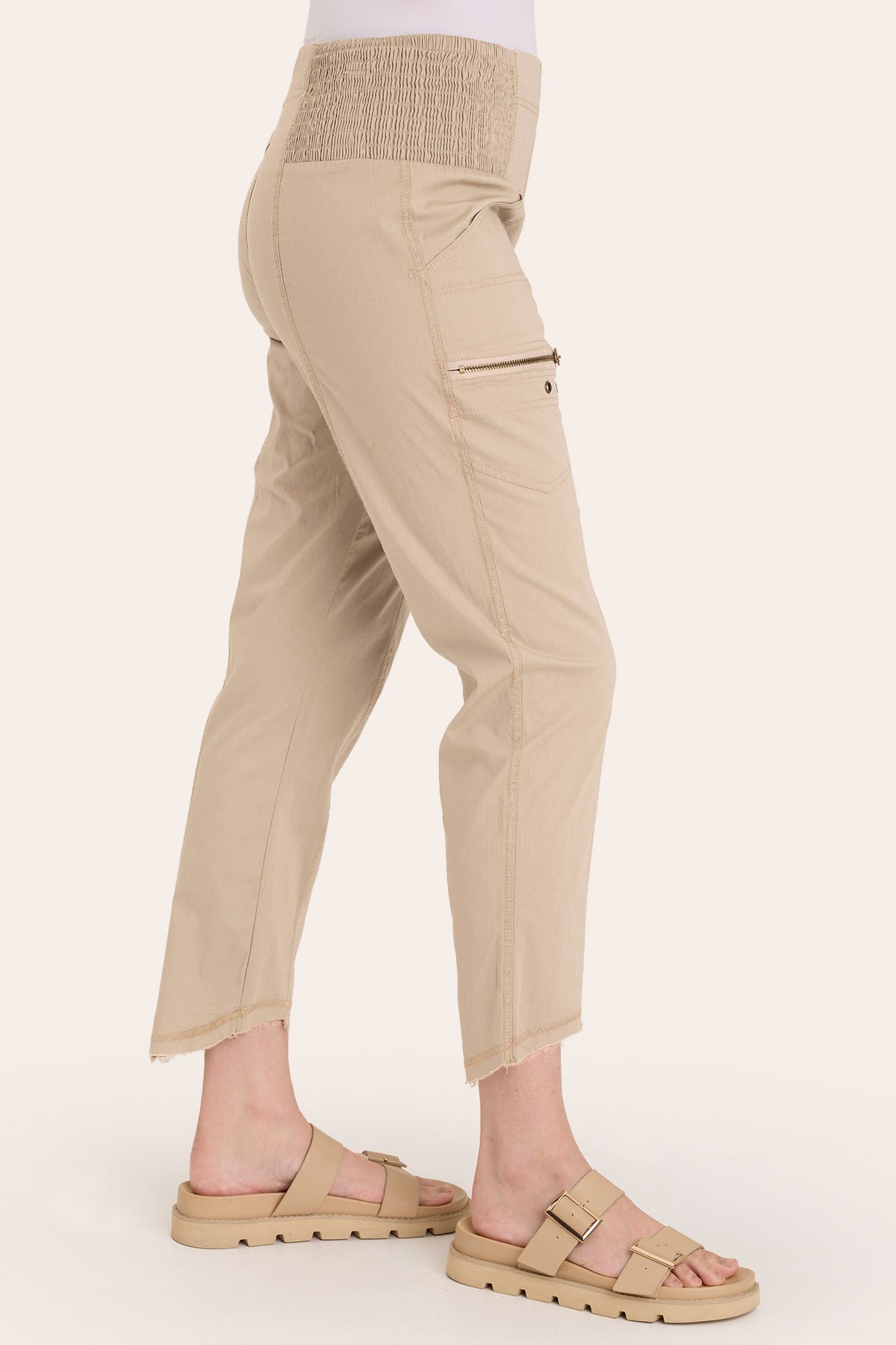 Core by Acker Zipper Slim Crop with shirred panels, zipper pockets, and raw-edge distressed rounded hem in Beige  - XCVI