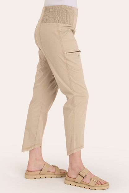 Core by Acker Zipper Slim Crop with shirred panels, zipper pockets, and raw-edge distressed rounded hem in Beige  - XCVI