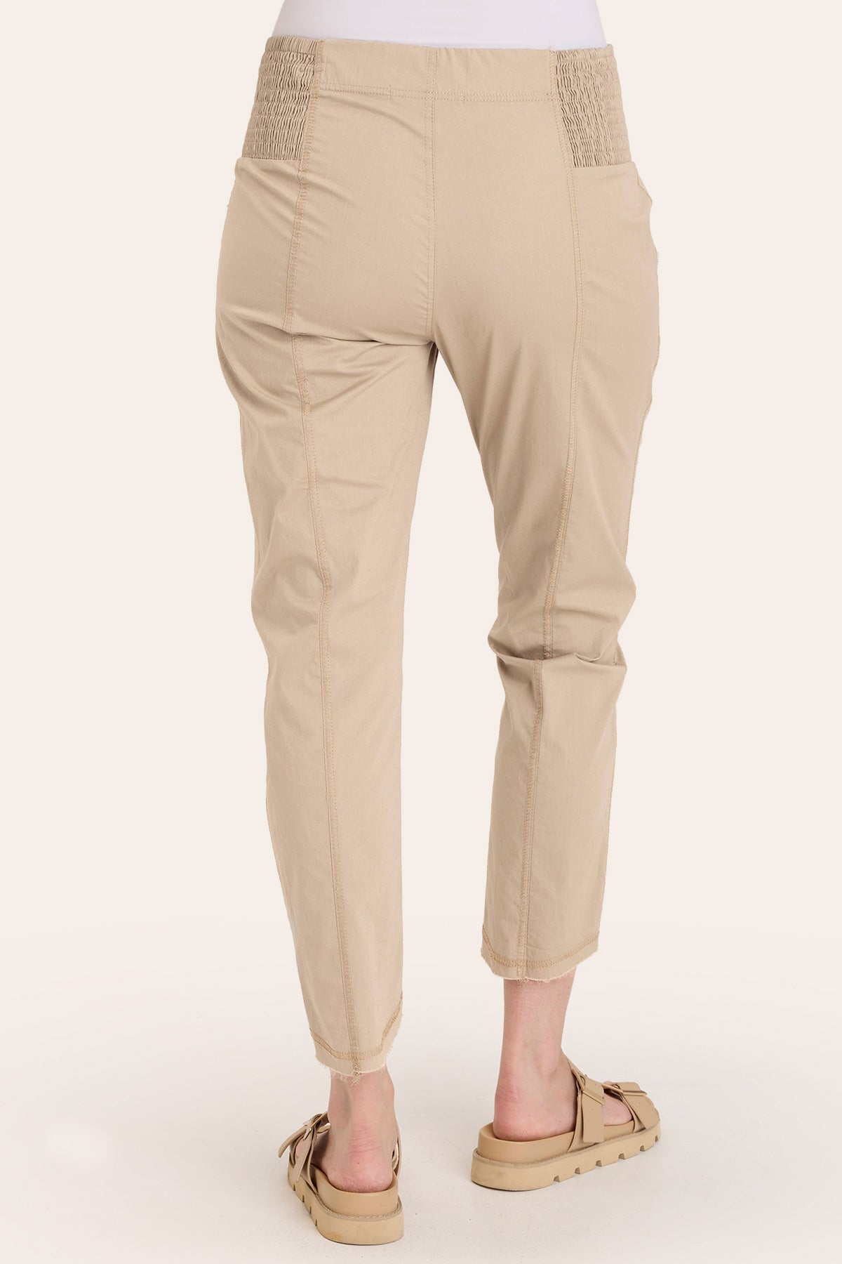 Core by Acker Zipper Slim Crop with shirred panels, zipper pockets, and raw-edge distressed rounded hem in Beige  - XCVI
