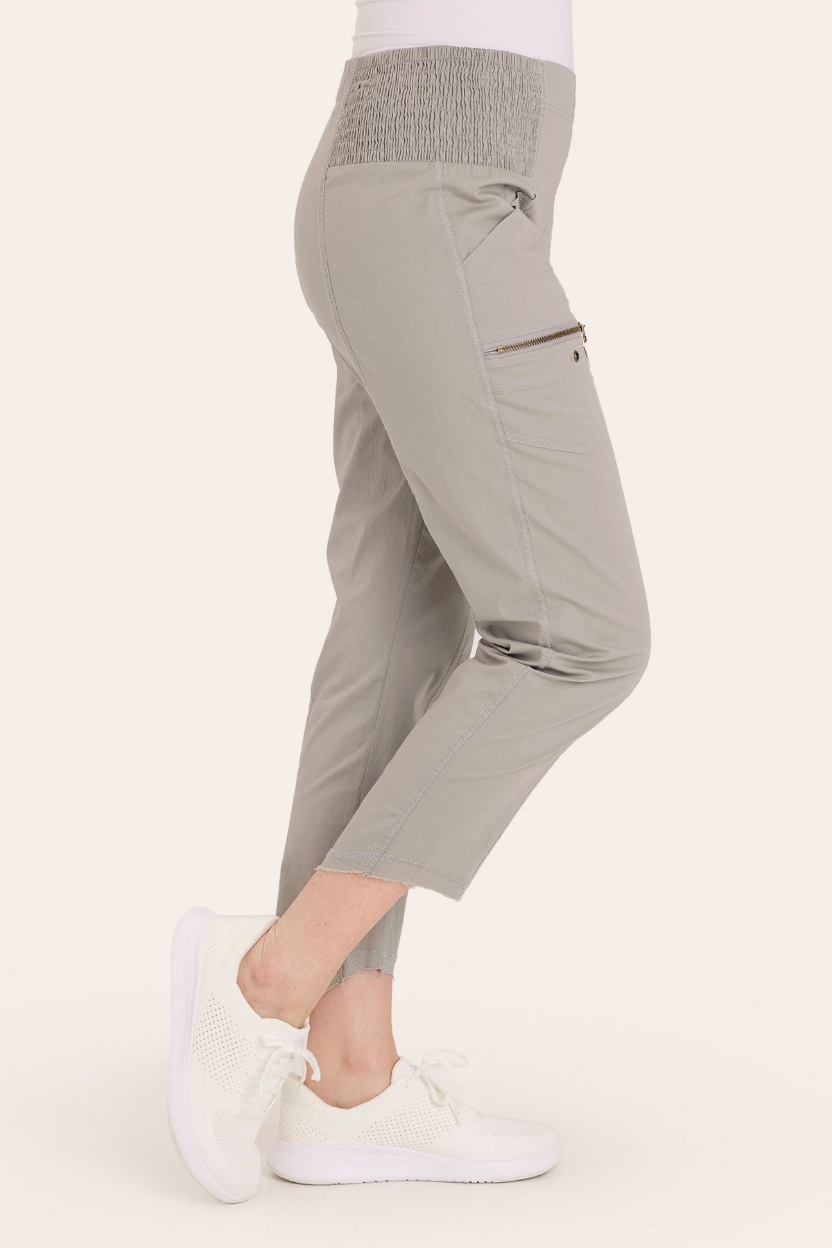 Core by Acker Zipper Slim Crop with shirred panels, zipper pockets, and raw-edge distressed rounded hem in Grey  - XCVI