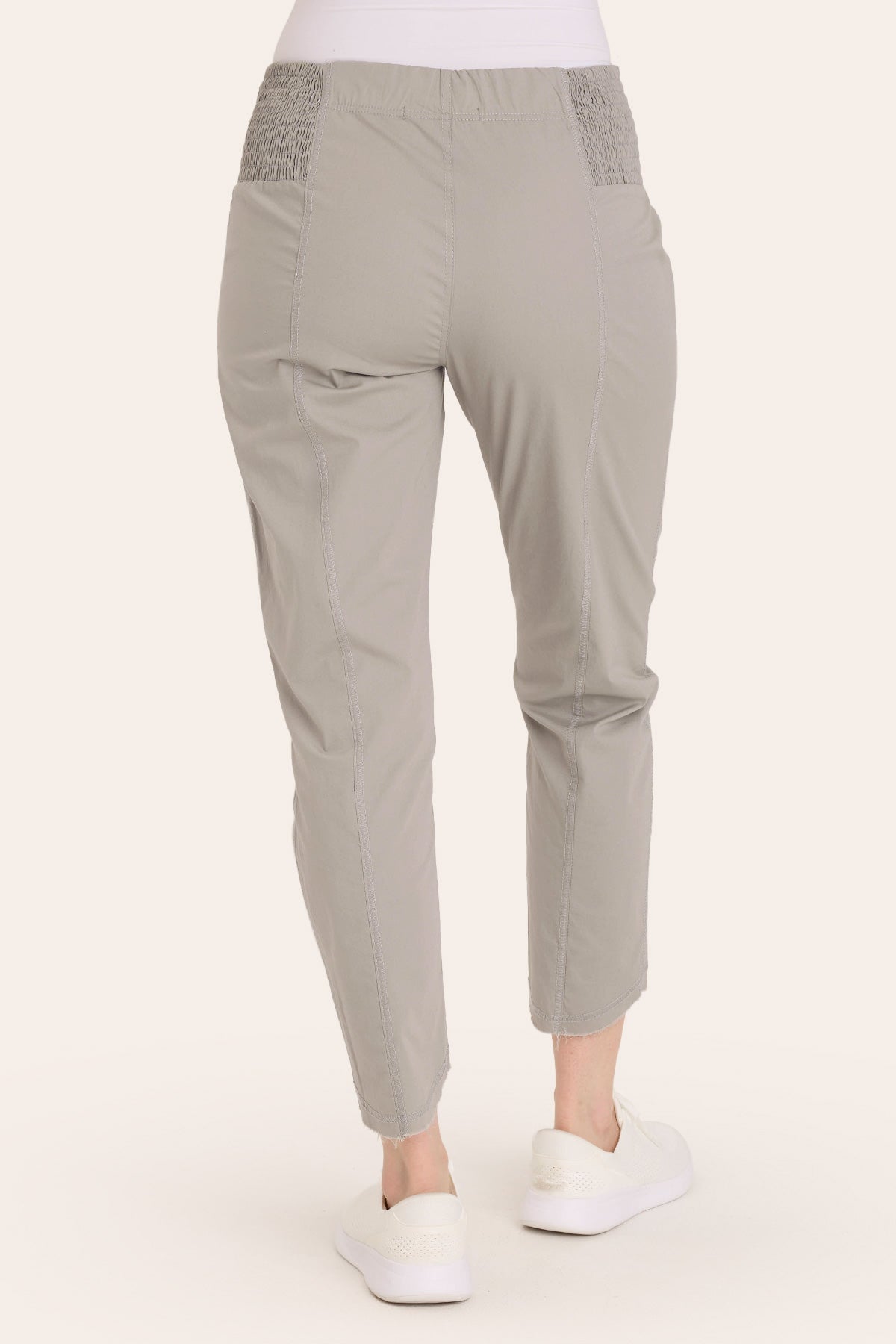 Core by Acker Zipper Slim Crop with shirred panels, zipper pockets, and raw-edge distressed rounded hem in Grey  - XCVI