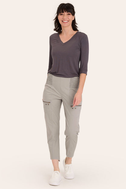 Core by Acker Zipper Slim Crop with shirred panels, zipper pockets, and raw-edge distressed rounded hem in Grey  - XCVI
